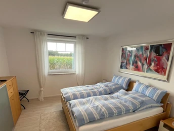 Schlafzimmer der Ferienwohnung Am Wald Schlafzimmer der Ferienwohnung Am Wald