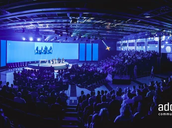 add on communication GmbH - Conference room Conference hall with audience and stage.