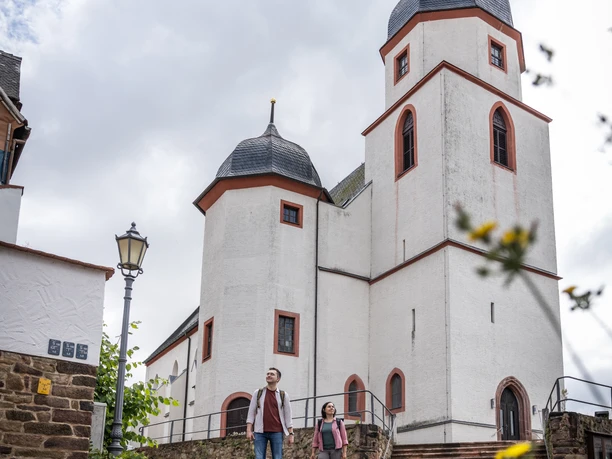 Stadtkirche St. Egidien - Churches in the Leipzig region The St. Egidien Church in Colditz looks impressive against a cloudy sky.