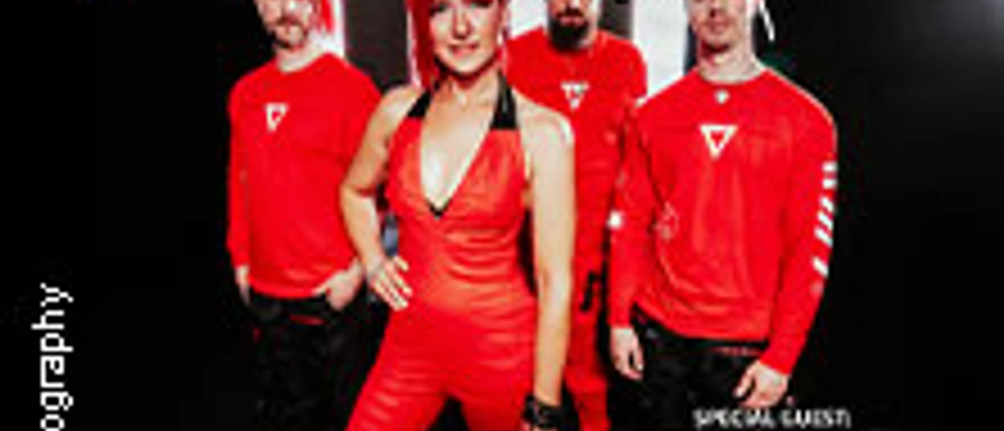 Vier Bandmitglieder in roten Outfits vor schwarzem Hintergrund mit "April Art Tour 2026"-Schriftzug.