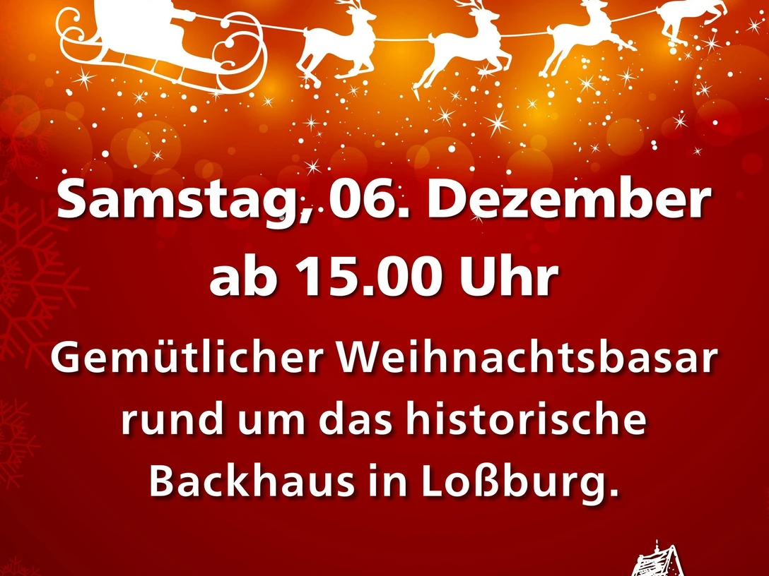 Weißer Weihnachtsschlitten der über Backhäusle fliegt