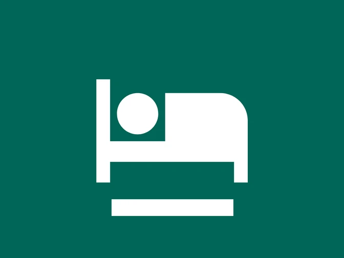 Unterkünfte im Kulturland Teufelsmoor Piktogramm eines Bettes als Symbol für Unterkunft im Kulturland Teufelsmoor auf grünem Hintergrund.