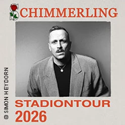 Porträt von Schimmerling in grauem Anzug, bewirbt die Stadiontour 2026.