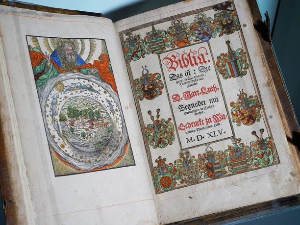 Discover the Book of Books – the Luther Bible Open Luther Bible on a table, clearly visible pages with classic typography.