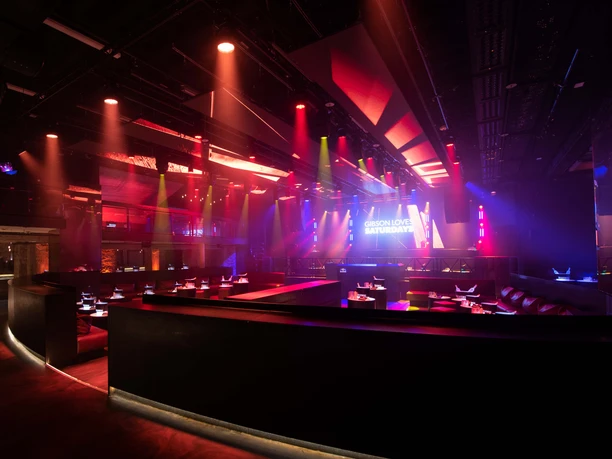 Gibson Club - Interior view Club with a lounge area and colorful spotlights on the ceiling