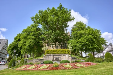 Stadtbrunnen Hilchenbach Brunnen und ev. Kirche Hilchenbach