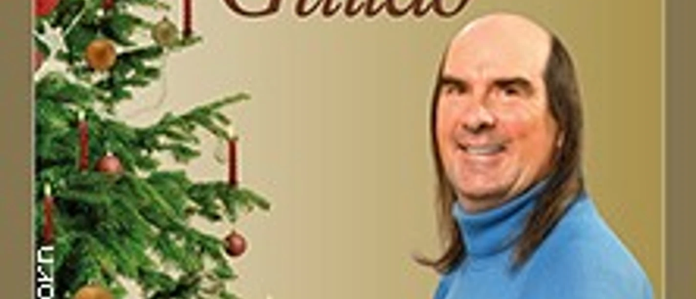 Albumcover mit Weihnachtsbaum, goldenem Hintergrund und Schriftzug Weihnachten mit Guildo