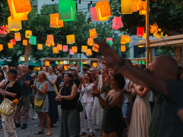 WDC Lantern Festival Audience celebrating under colorful lanterns at outdoor event
