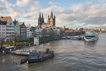 Rhine bank in Cologne Boats on the Rhine in front of Cologne's old town and striking skyline create a lively excursion atmosphere