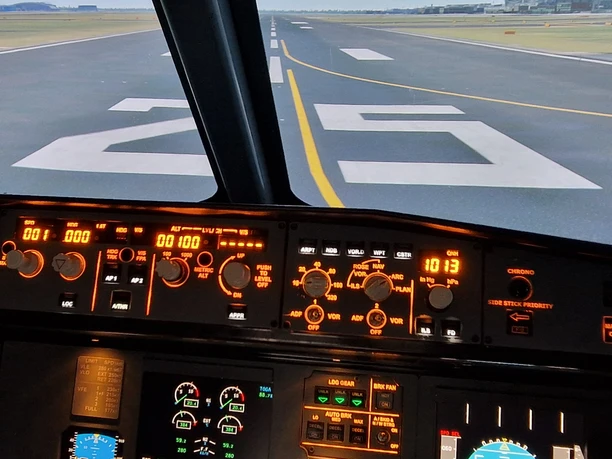 Frankfurt flight simulator Cockpit view facing runway 25 before takeoff