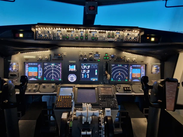 Frankfurt flight simulator Central cockpit panel with displays and control levers