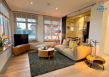 Wohnzimmer_LandhausGertrude107-WohnungSchöneJuisterin.png