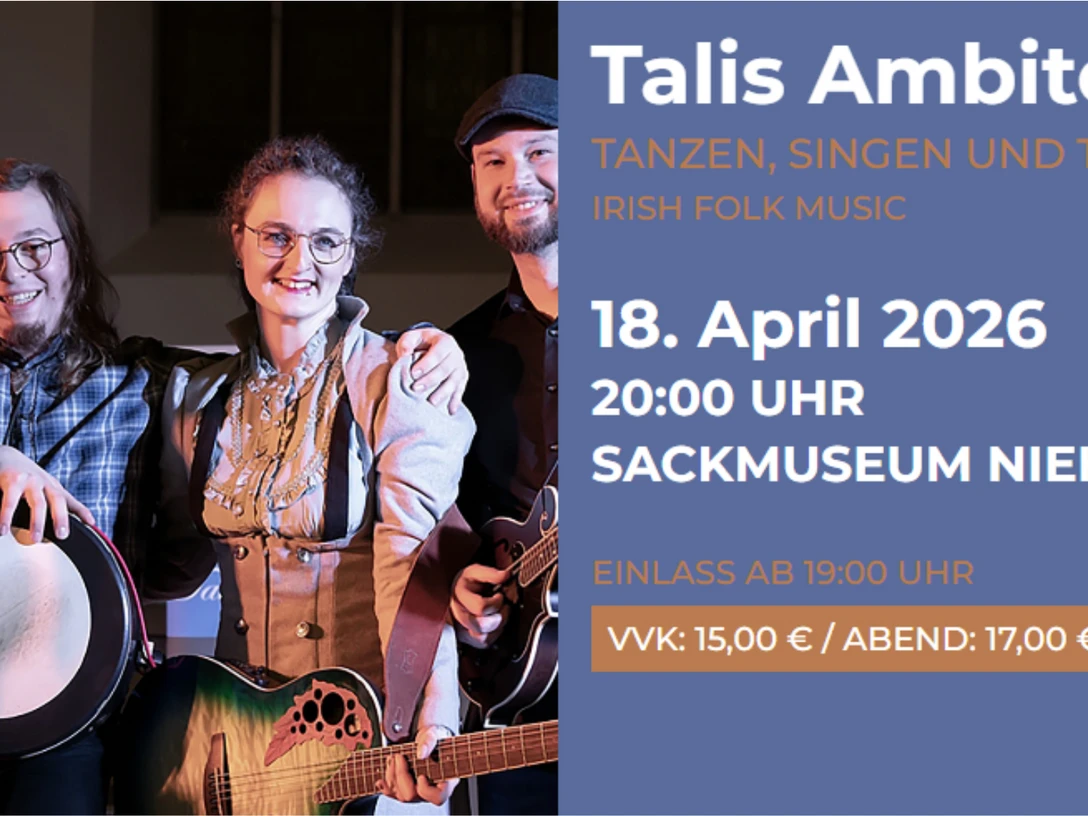 Talis Ambiton.jpg Vier Musiker stehen eng beisammen und halten ihre Instrumente im Bühnenlicht.