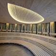 Main Bad Bornheim - Sauna area Round sauna room with wooden benches and luminous ceiling