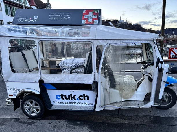 Fondue-Tuk Luzern The Fondue Tuk Tour combines sightseeing with the enjoyment of the best cheese fondue.