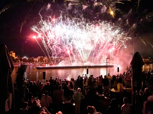 Cologne lights View of fireworks on the Rhine from the riverbank