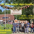 Sportwoche Greetsiel Sportwoche mit Sportplatz, Dartspiel und Besuchergruppe vor Vereinsheim