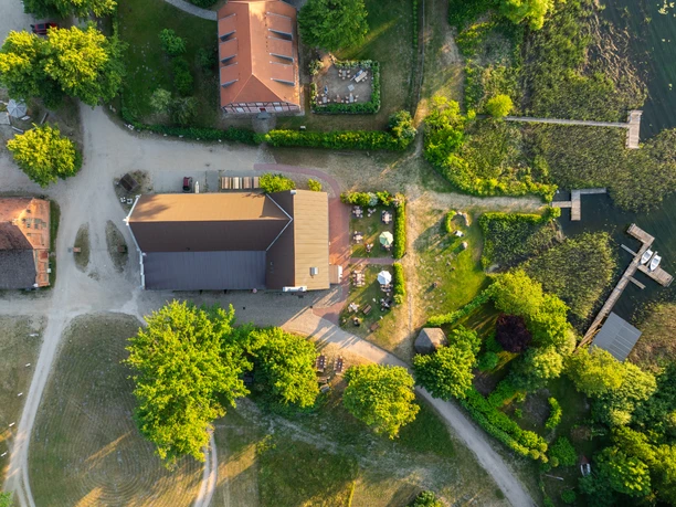 Gut Große Zecher from above Aerial photo shows buildings, paths, trees and footbridges by the water on the Groß Zecher estate.