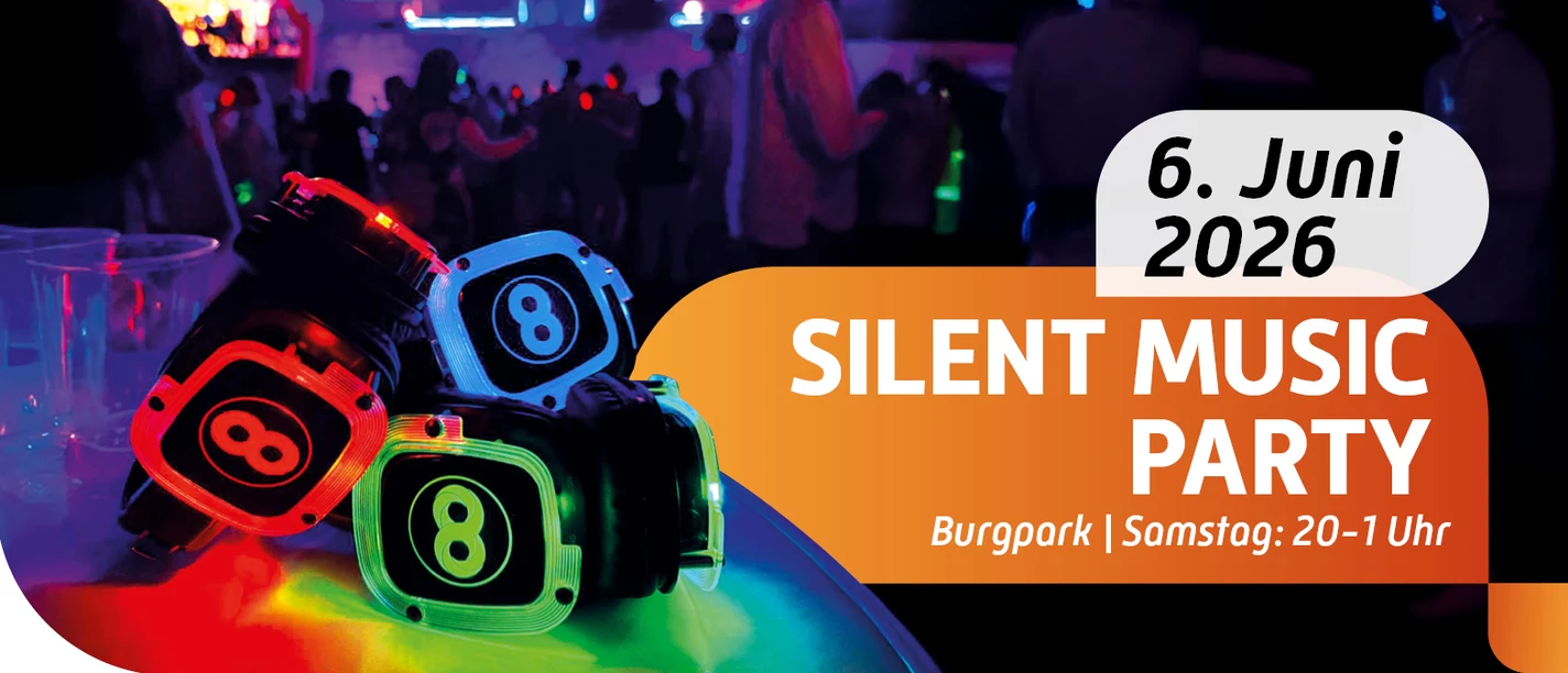 Eventfrog_1568x958.jpg Silent Music Party beleuchtete Kopfhörer mit illuminiertem Burgpark im Hintergrund