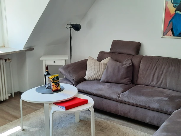 Wohnlandschaft im Wohnzimmer der Ferienwohnung Brunnenstraße Wohnlandschaft im Wohnzimmer der Ferienwohnung Brunnenstraße