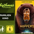 filmplakat-hoppers.jpg Filmplakat Hoppers mit Biber im Maul eines Bären, Schriftzug Familienkino Rhythmus Filmtheater