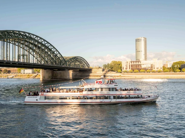 Panorama tour Cologne KD passenger ship in front of the Hohenzollern Bridge on the Rhine with the Cologne skyline