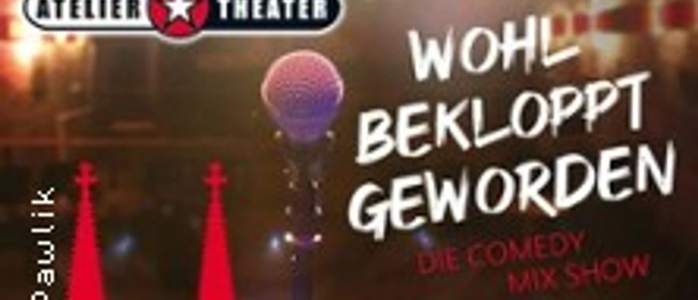 Mikrofon auf Bühnenpodest vor warmen Lichtern mit dem Schriftzug Wohl bekloppt geworden