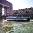 The Kölntourist passenger boat at the Rheinauhafen Excursion boat RheinPerle sails past Cologne's Rheinauhafen harbor in front of the striking crane buildings.