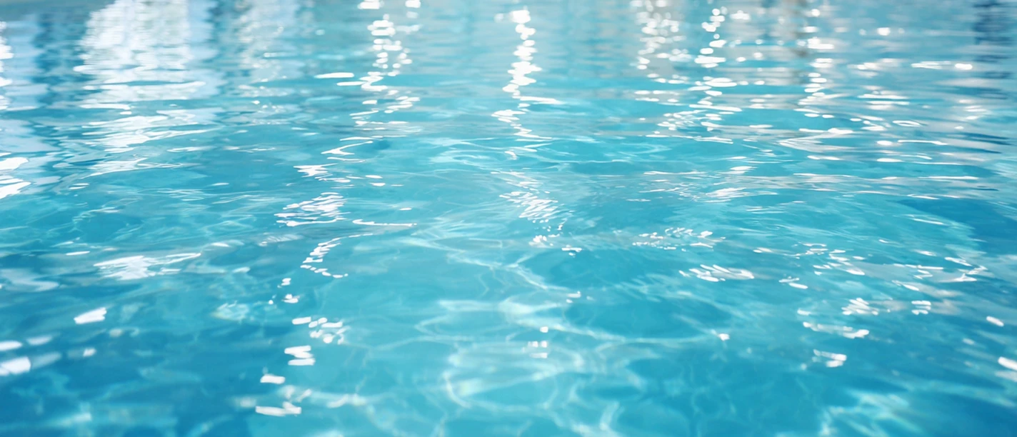 Binnenzwembad symboolafbeelding | AI-gegenereerd Hallenbad Beispielbild