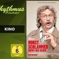 Filmplakat Horst Schlämmer sucht das Glück mit überraschter Figur im Anzug.