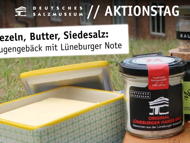 Aktionstag "Brezeln, Butter, Siedesalz" im Deutschen Salzmuseum Butterdose, Gläser mit Salz und Brot auf einem Brettchen auf der Wiese vor dem Salzmuseum