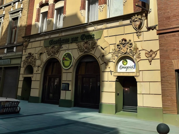 Oma dish exterior view Historic façade with ornate arches and entrance to the Omagerichte restaurant
