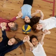 medium-shot-kids-laying-gym-floor a