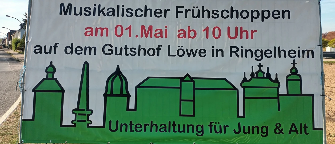Fruehschoppen_Gutshof_1.Mai_HD_16zu9.jpg Weißes Banner für den musikalischen Frühschoppen am 1. Mai auf dem Gutshof Löwe in Ringelheim.