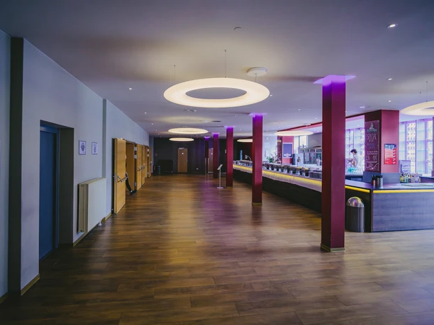 Foyer with bar on the first floor at Haus Leipzig event venue – presented by Leipzig Convention Bureau