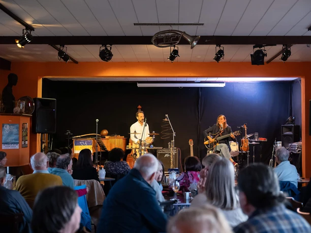 Frankfurt Art Bar - Interior Concert in small hall with stage and audience