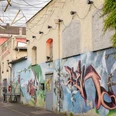 Frankfurt Milchsackfabrik - Exterior view Facade with street art and light installation