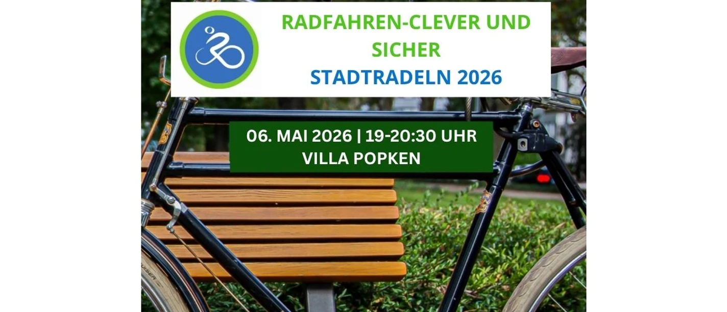 Fahrradaktionstag (1290 x 790 px) (4).jpg Ein schwarzes Fahrrad vor einer Holzbank kündigt den Fahrradaktionstag Stadtradeln an.