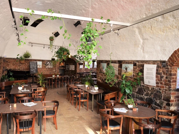 View into the vaults inside the Moritzbastei with the light-flooded Café Barbakane