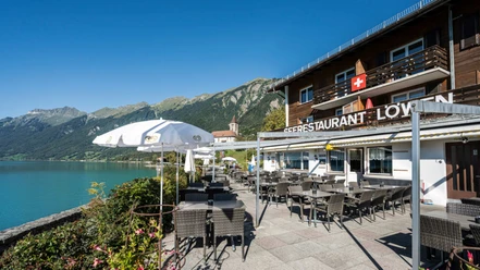 restaurant-loewen-terrasse-aussicht-see-kirche.jpg