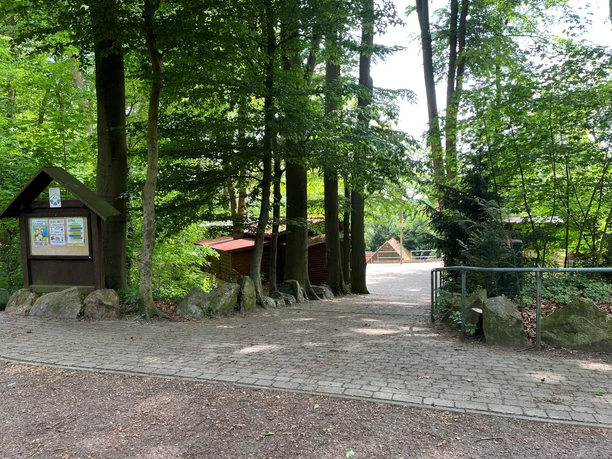 Daverden open-air stage A paved path with a showcase leads between trees down to the open-air stage.