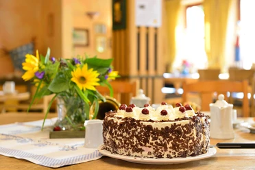 Gedeckter Tisch im Landcafé Neubokel Gedeckter Tisch im Landcafé Neubokel