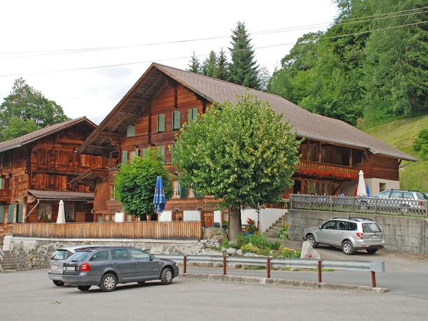 Inn Gasthof Rothbad Parking lot of the inn, in the background you can see the restaurant building