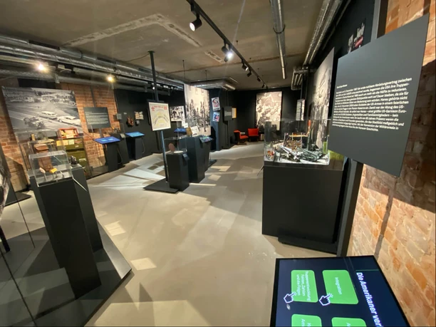Exhibition with display cases and media stations