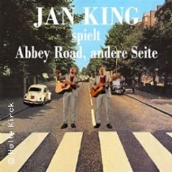 Plakat zu Jan King: zwei Musiker mit Gitarren auf einem Zebrastreifen im Abbey-Road-Stil