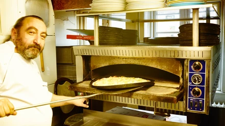Pizzeria Tomato: Pizzabäcker Pizzeria Tomato: Pizzabäcker
