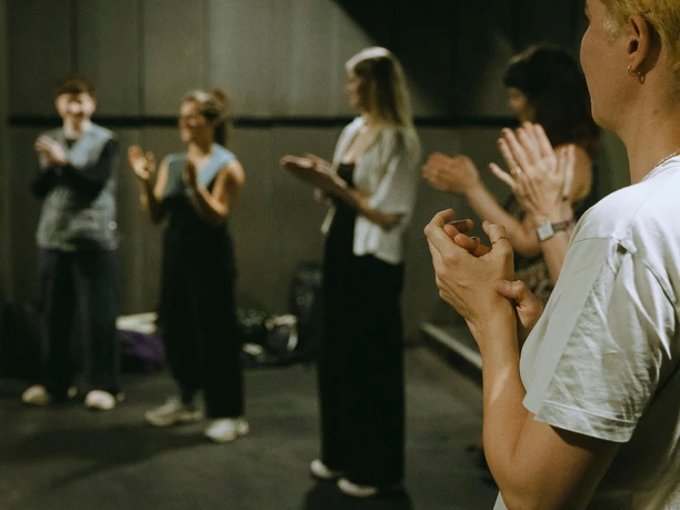 ritual: Music, Walks, and Community Participants clap in a circle at a ritual music event in Cologne