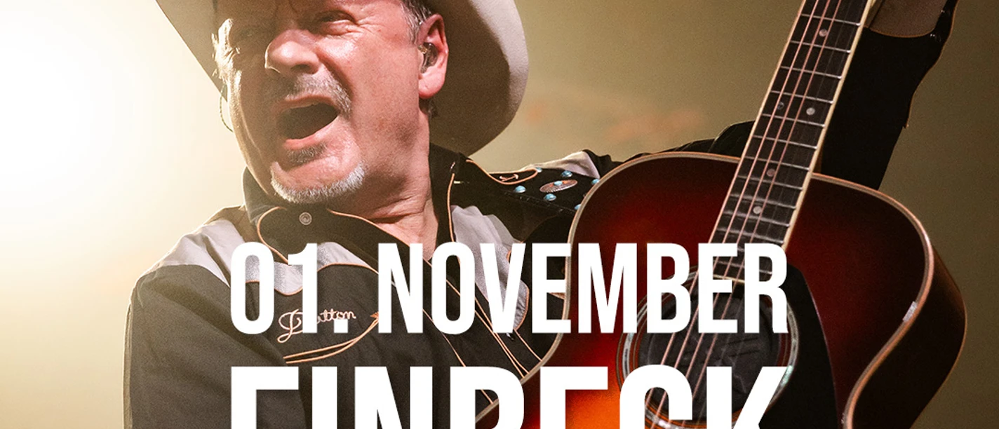 Einbeck_Andreas_Bild_1x1.jpg Truck Stop Sänger mit Cowboyhut und Gitarre, Konzertplakat für den 01. November in Einbeck.