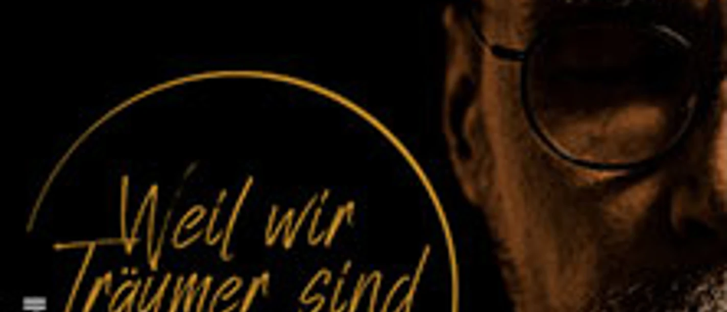 Konzertplakat von Staubkind mit „Weil wir Träumer sind – Live“ und halbem Porträt