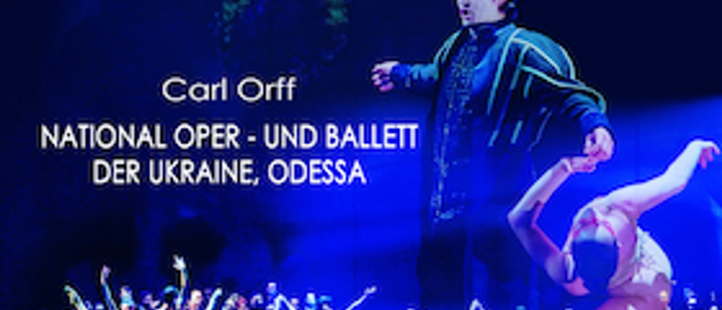 Plakat zu Carmina Burana mit Tänzern auf blau beleuchteter Bühne und gelbem Titel.